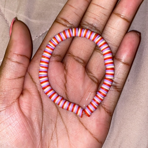 red, tan and purple bracelet - Picture 2 of 3
